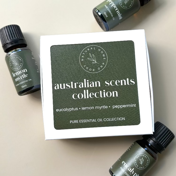 Essential oil bottles with a packaging box labeled 'Australian Scents Collection' on a light background