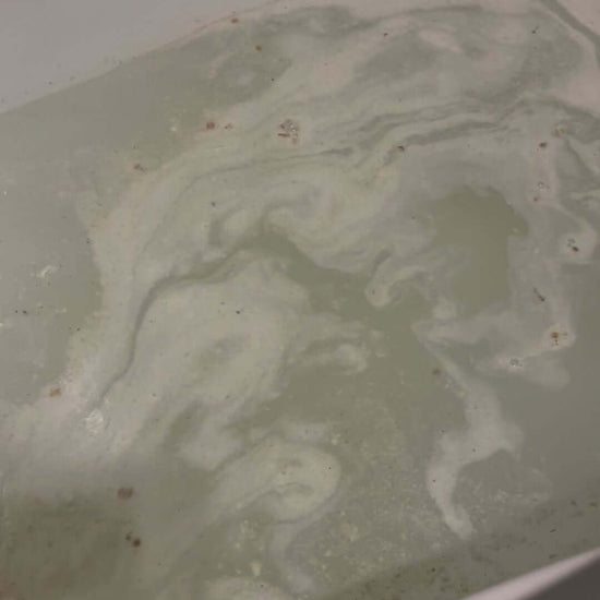 Running bath with some Nourish magnesium bath soak dissolved in the water.