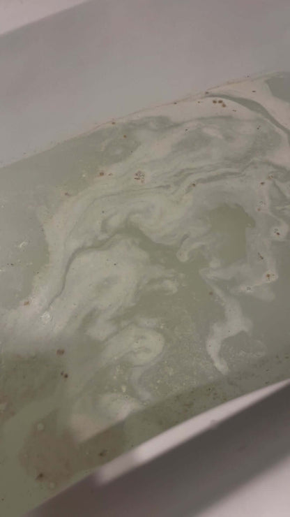Running bath with some Nourish magnesium bath soak dissolved in the water.